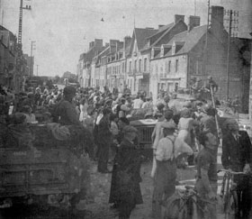 French residents flock to streets of Sartilly, in Normandy, to welcome 8th Division doughboys moving through in pursuit of fleeing Germans.